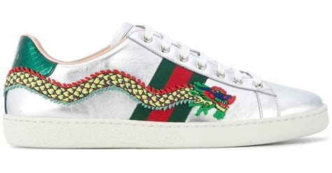 dragon sneakers gucci|Gucci ace embroidered shoes.